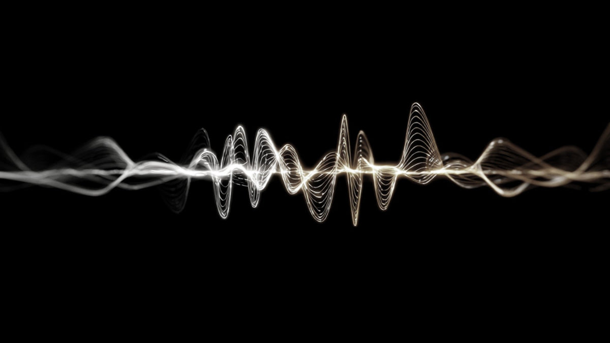 The same waveform after streaming compression, thinner and with far less detail